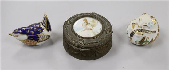 A French 19th century ormolu circular trinket box and two Royal Crown Derby paperweights, Dia 10cm